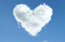 White clouds in the shape of a heart